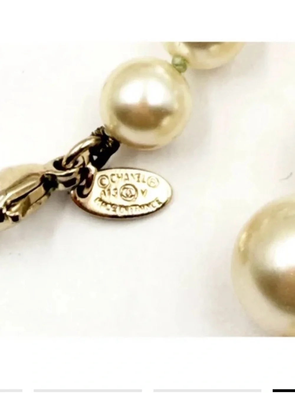 CHANEL Ivory Faux Pearl Long Necklace with CC Logo Charms